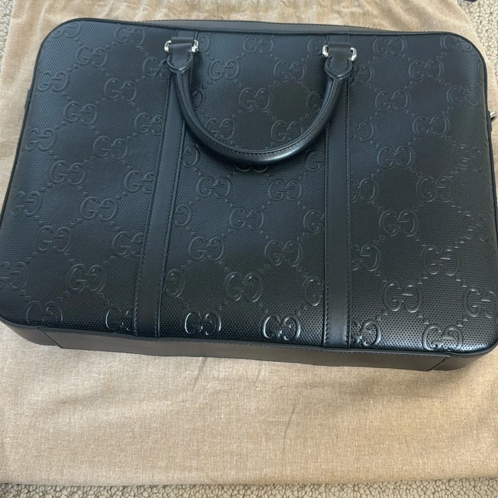 New-Gucci leather bag. Can be used for work or travel. fit laptop & work files.